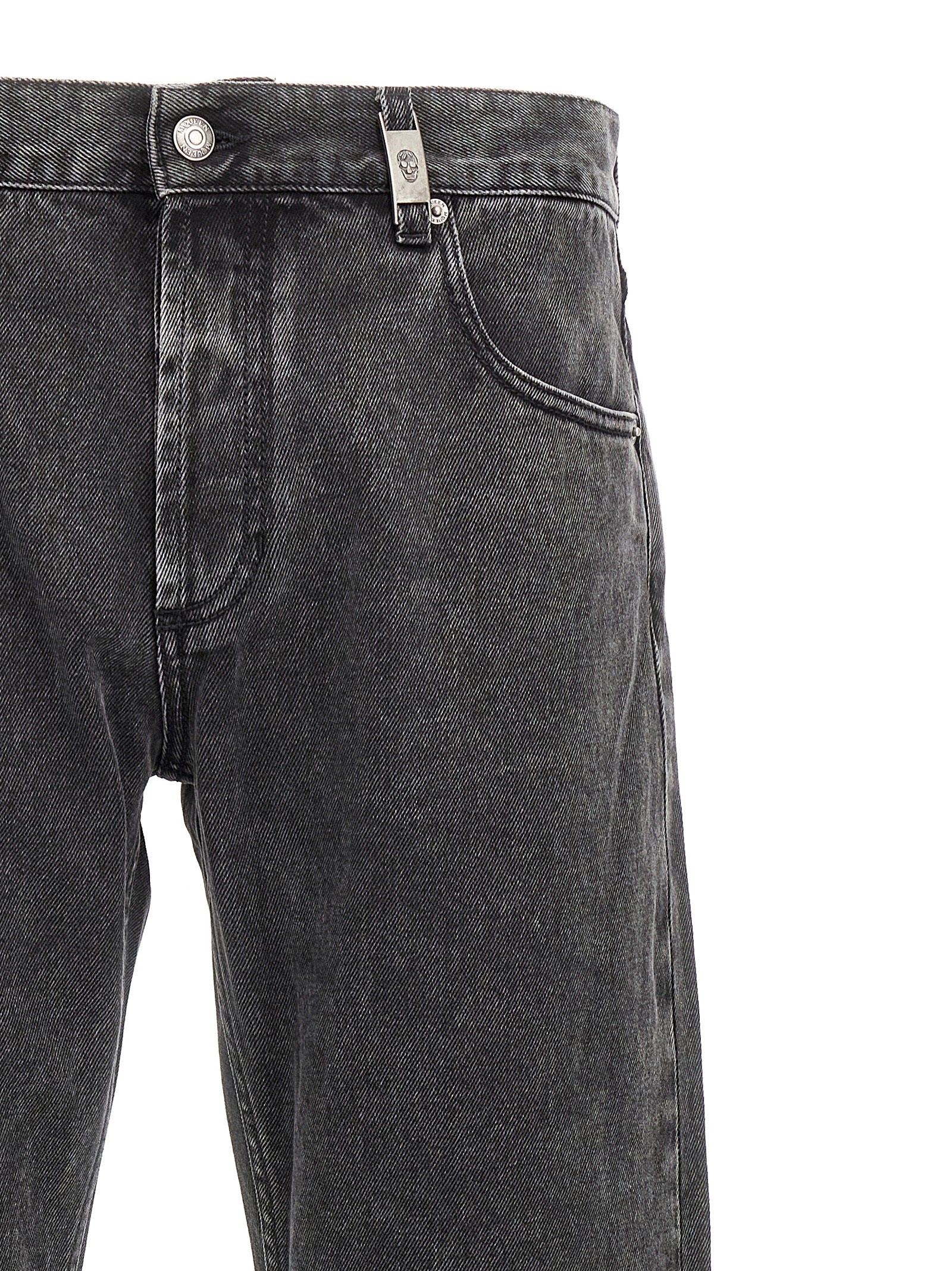Jeans by Alexander McQueen for men in denim cotton black presents a refined pantology silhouette, artfully defined by a refined pantology straight-leg, long, and a sophisticated .