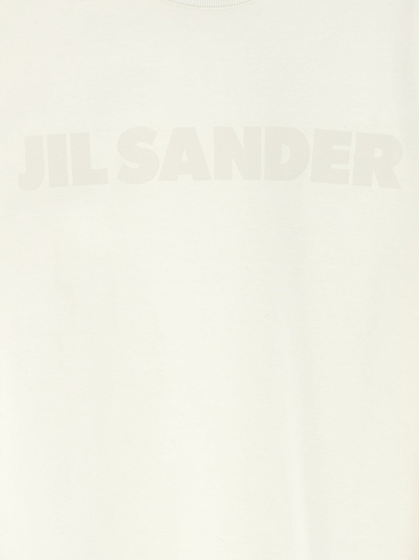 T-Shirt by Jil Sander for women in cotton white & print showcases a fashionable silhouette, elegantly detailed with a fashionable and for a sophisticated, high-fashion look.