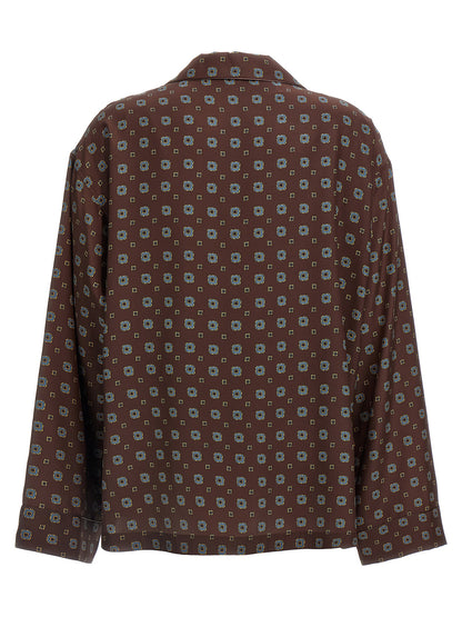 Blouse by Moschino for women in silk brown, patterned & print showcases a sharp silhouette, elegantly detailed with a sharp and sharp .