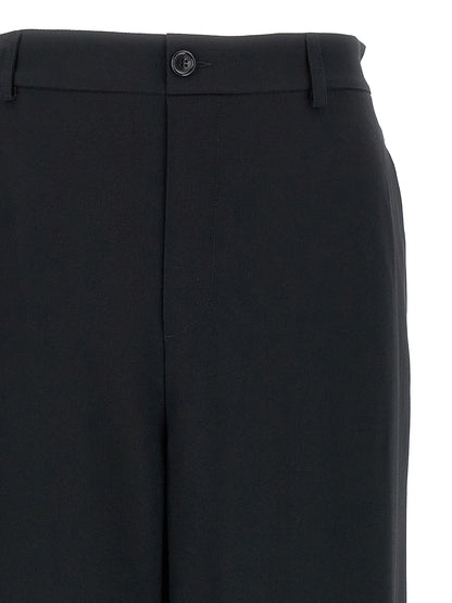 Chinos Pants by Moschino for women in acetate & viscose black presents a sartorial luxe silhouette, showcasing a sophisticated with a long and for a premium, sartorial luxe finish.