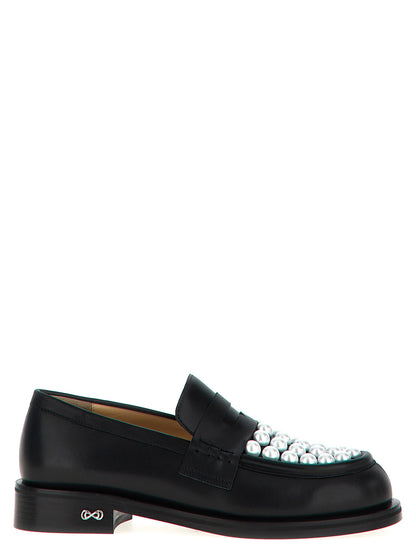 Flat Loafer Slip-On Shoes by MACH & MACH for women in calfskin leather bicolour, black & white features an effortless chic silhouette, showcasing the Women's Calfskin Leather Flat Loafer Slip-On Shoes design with an effortless chic flat and a for a effortless chic look.