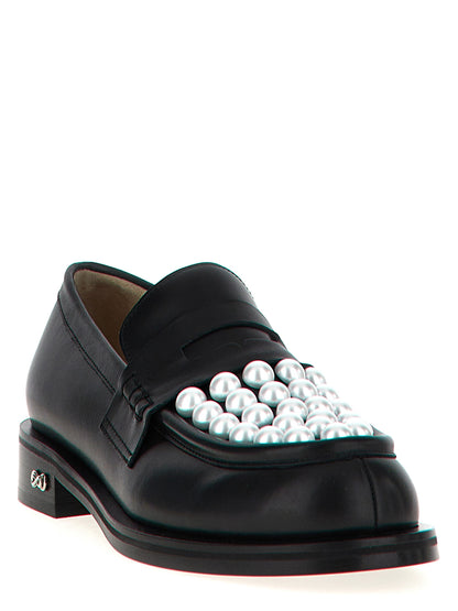 Flat Loafer Slip-On Shoes by MACH & MACH for women in calfskin leather bicolour, black & white showcases a timeless silhouette from the Women's Calfskin Leather Flat Loafer Slip-On Shoes collection, featuring a timeless flat and for a timeless finish.