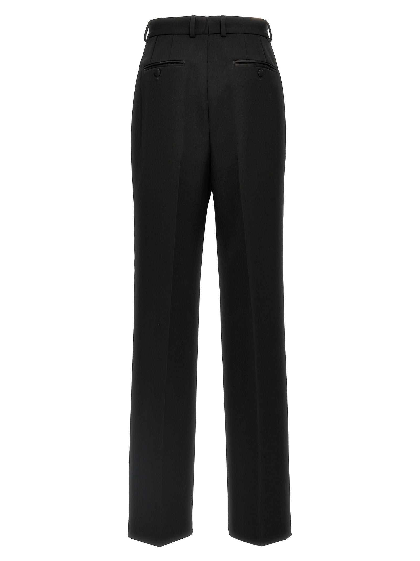 Trousers by Dolce & Gabbana for women in virgin wool polyester & silk black features a tailored silhouette with a tailored , defined by its long and a sophisticated high rise.