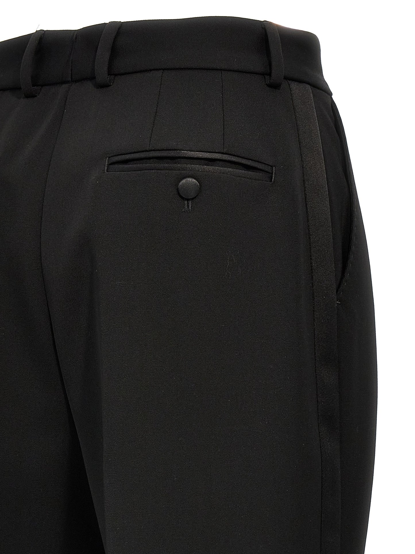 Trousers by Dolce & Gabbana for women in virgin wool polyester & silk black features a artisanal silhouette, showcasing a sophisticated with a long and high rise for a artisanal finish.