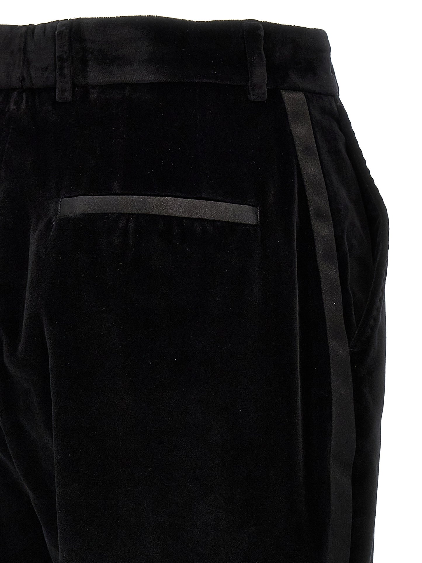 Trousers by Dolce & Gabbana for women in polyester cotton & silk black features an sartorial silhouette, showcasing a precise and long with a sartorial for a refined look.