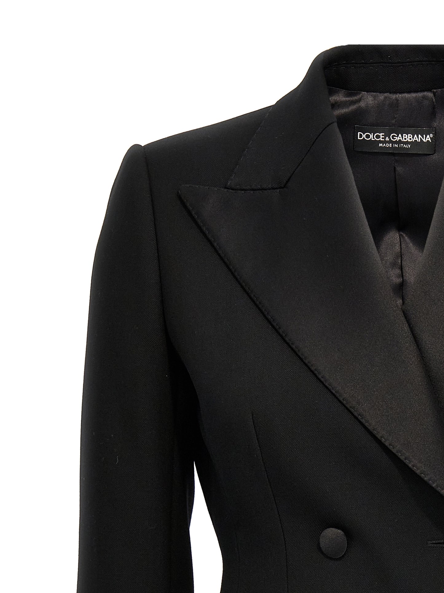 Blazer by Dolce & Gabbana for women in polyester silk & virgin wool black showcases a discerning silhouette, elegantly detailed with a sophisticated and premium for a truly discerning finish.