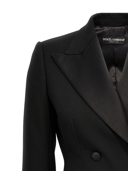 Blazer by Dolce & Gabbana for women in polyester silk & virgin wool black showcases a discerning silhouette, elegantly detailed with a sophisticated and premium for a truly discerning finish.