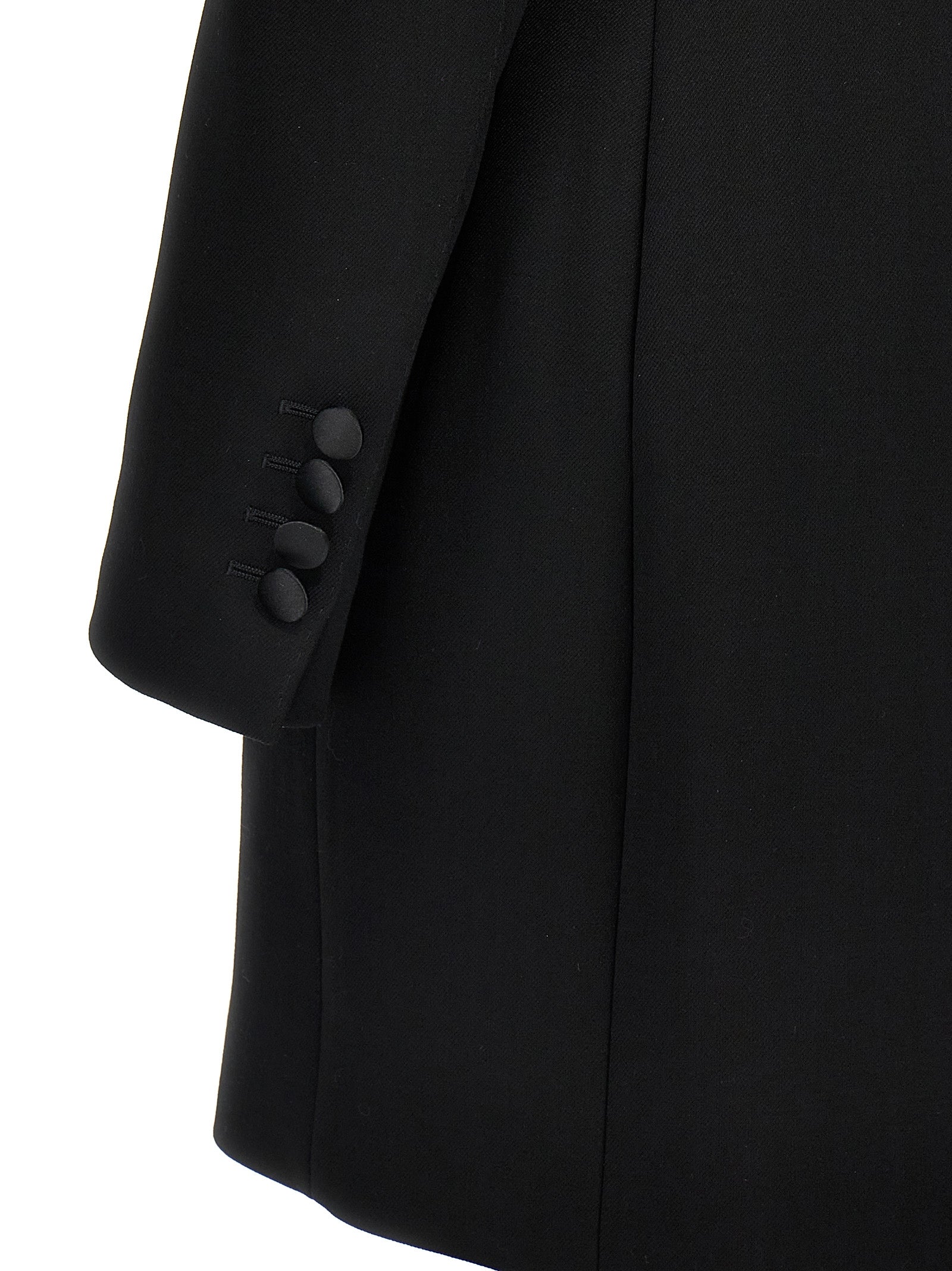Blazer by Dolce & Gabbana for women in polyester silk & virgin wool black presents a distinguished silhouette, detailed with a distinguished and distinctive for a truly sophisticated finish.