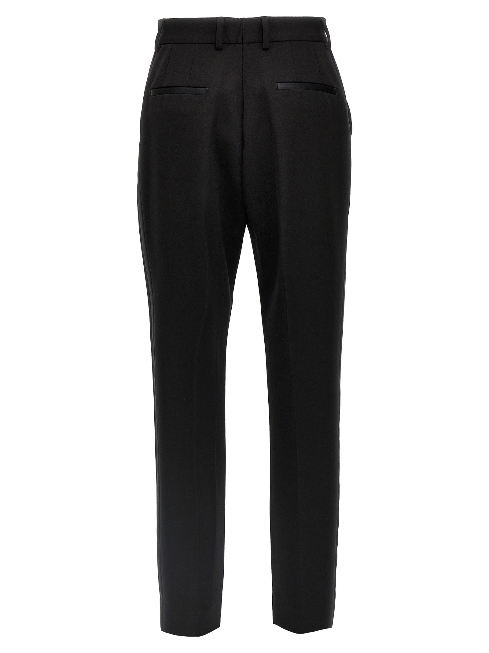 Trousers by Dolce & Gabbana for women in virgin wool polyester & silk black features an sartorial silhouette, showcasing a precise and long with a sartorial high rise for a refined look.