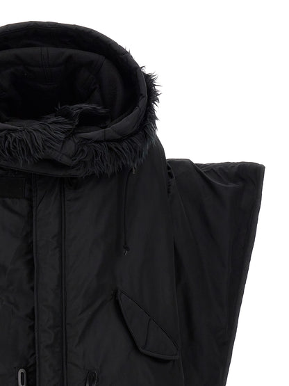 Hooded Puffer Jacket by Junya Watanabe for women in nylon faux fur black presents a effortlessly chic silhouette, showcasing a sophisticated hooded neckline and premium pockets, hooded & insulated for a truly effortlessly chic finish.