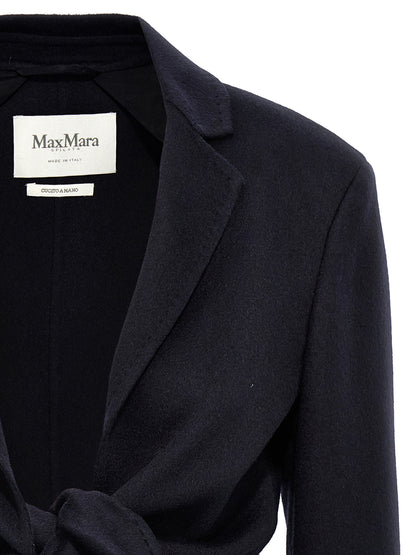 Overcoat by Max Mara for women in wool blue & camel showcases a enveloping silhouette, detailed with distinctive and a enveloping lapel neckline.
