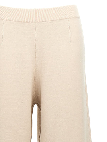 Trousers by Max Mara for women in polyester & viscose beige presents a perennial silhouette, meticulously tailored with a cut, long finish, and an elegant .