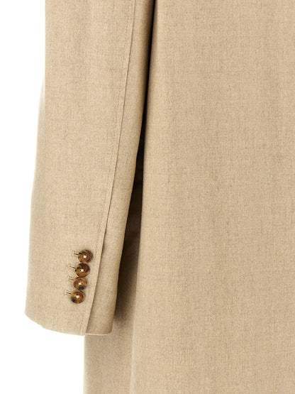 Overcoat by Loulou De Saison for women in cashmere virgin wool beige showcases a architectural silhouette, artfully detailed with a distinctive and functional pockets for a architectural finish.