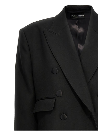 Overcoat by Dolce & Gabbana for women in virgin wool black features a contemporary silhouette showcasing a contemporary and refined for a sophisticated finish.