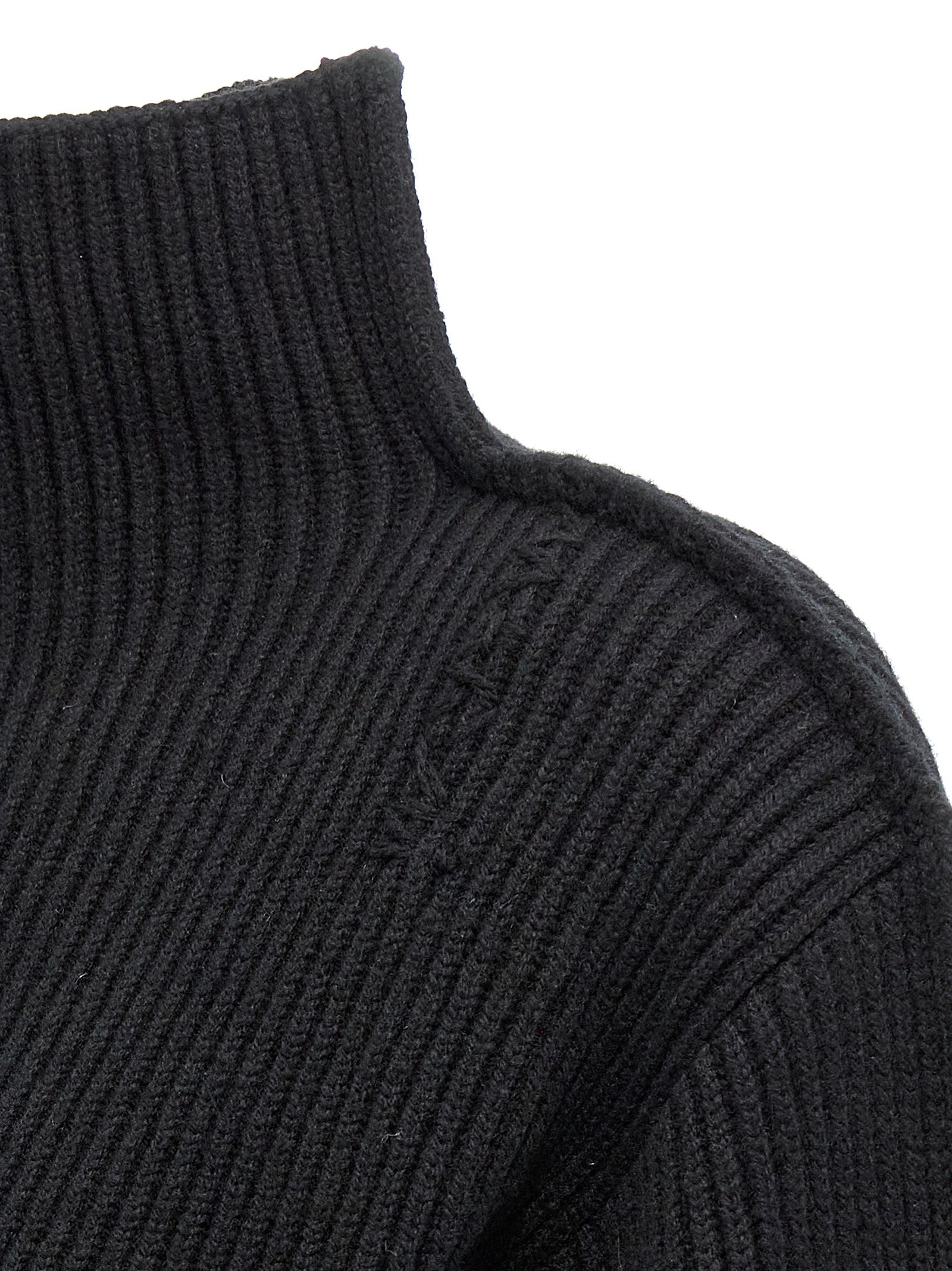 Cardigan by Marni for women in wool black showcases a captivating silhouette, artfully detailed with a captivating and for a truly sophisticated captivating look.