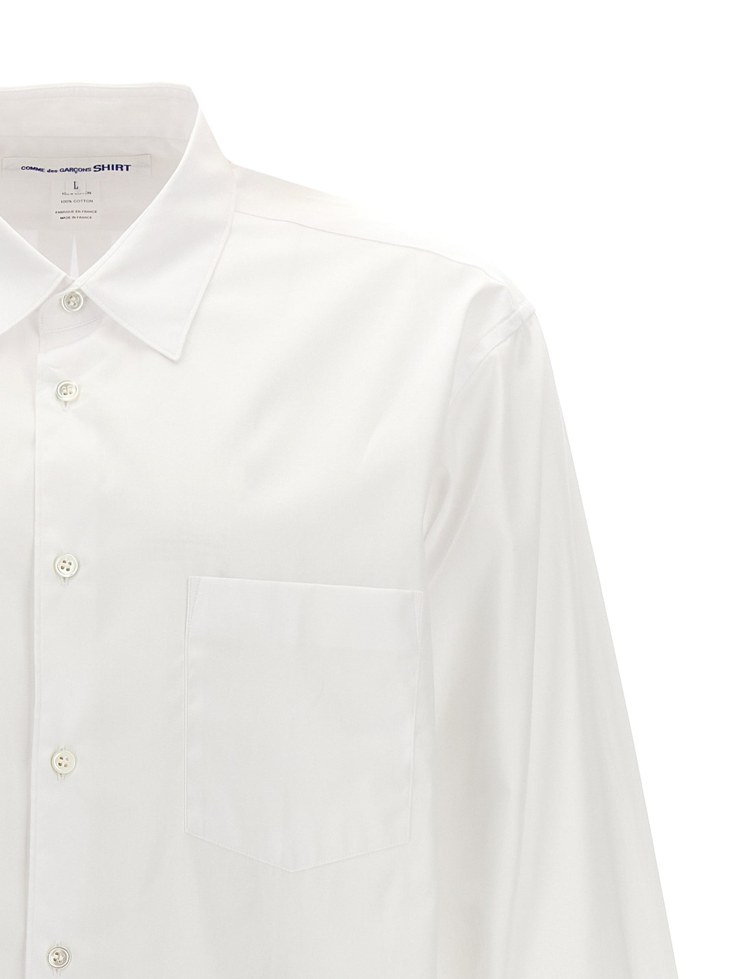 Shirt by Comme Des Garçons for men in cotton white showcases a sublime silhouette, artfully detailed with a sublime and for a sophisticated, sublime finish.