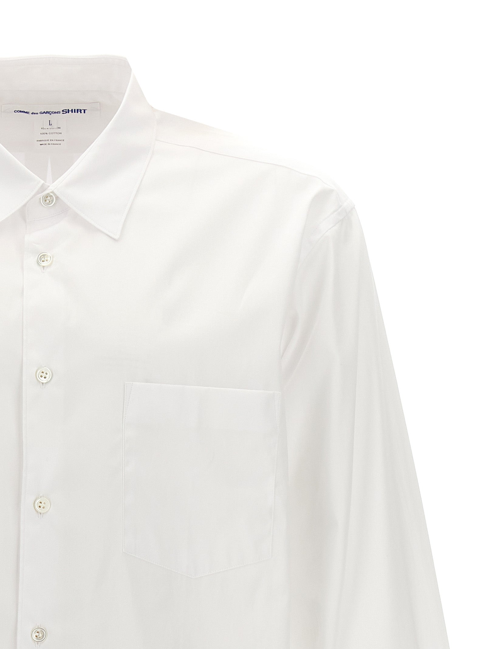 Shirt by Comme Des Garçons for men in cotton white showcases a sublime silhouette, artfully detailed with a sublime and for a sophisticated, sublime finish.