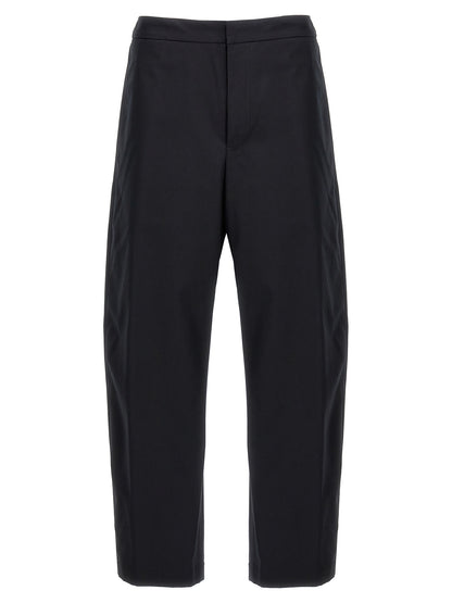 Trousers by Jil Sander for men in cotton blue & signature features a tailored silhouette with a tailored , defined by its long and a sophisticated .