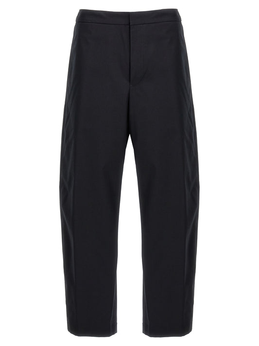 Trousers by Jil Sander for men in cotton blue & signature features a tailored silhouette with a tailored , defined by its long and a sophisticated .