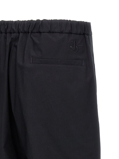 Trousers by Jil Sander for men in cotton blue & signature features a tailored silhouette with a tailored , defined by its long and a sophisticated .