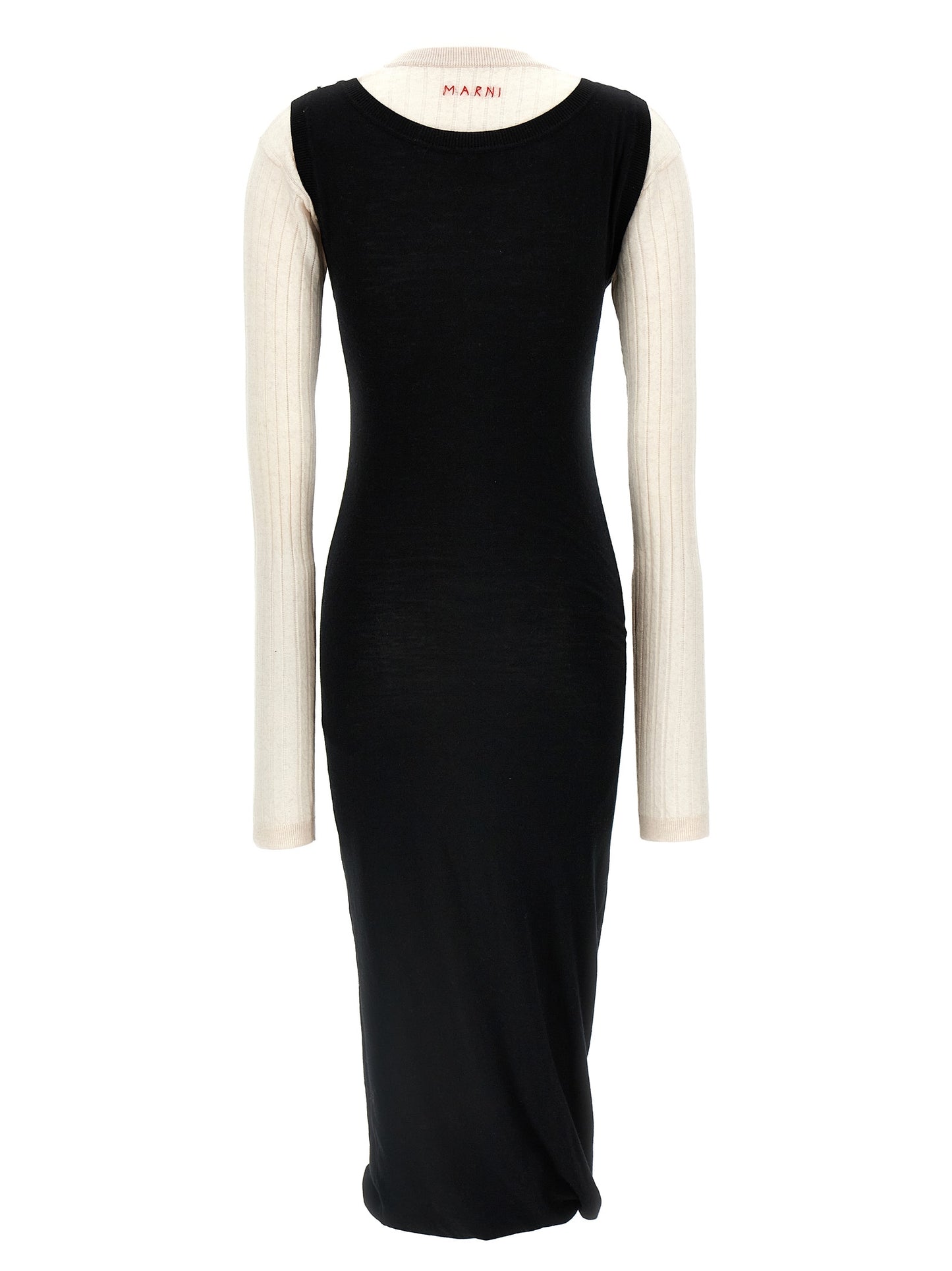Dress by Marni for women in wool bicolour, black & white features an magnificent silhouette, artfully detailed with a magnificent crew neckline and that flows into an magnificent midi.