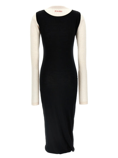Dress by Marni for women in wool bicolour, black & white features an magnificent silhouette, artfully detailed with a magnificent crew neckline and that flows into an magnificent midi.