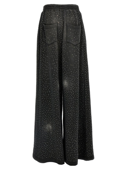 Joggers by Giuseppe Di Morabito for women in cotton & rhinestone black features a refined silhouette with a refined wide, defined by a and a refined long for a refined finish.