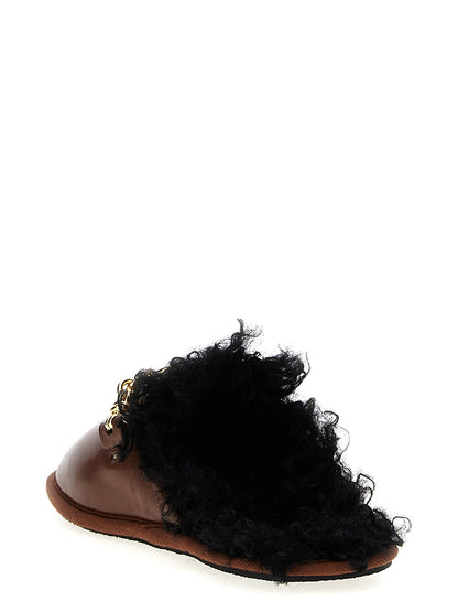 Mules Flat Shoes by Stella McCartney for women in resin polyethylene polyurethane leather brown showcases a enchanting silhouette as part of the Ryder Women's Resin Polyethylene Polyurethane leather Mules Flat Shoes collection, defined by a enchanting and for a enchanting look.
