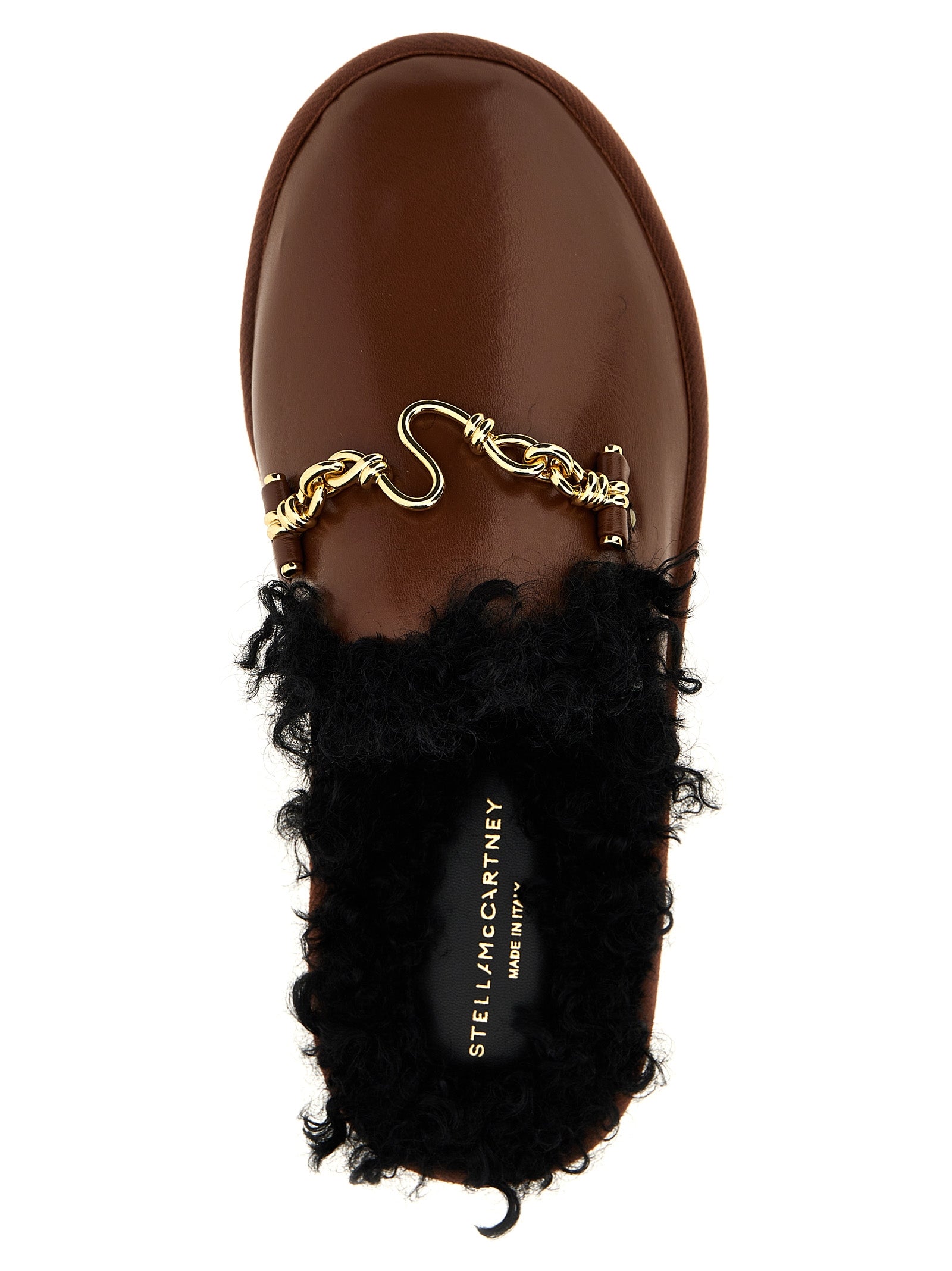 Mules Flat Shoes by Stella McCartney for women in resin polyethylene polyurethane leather brown showcases a resplendent Ryder Women's Resin Polyethylene Polyurethane leather Mules Flat Shoes aesthetic with a and .