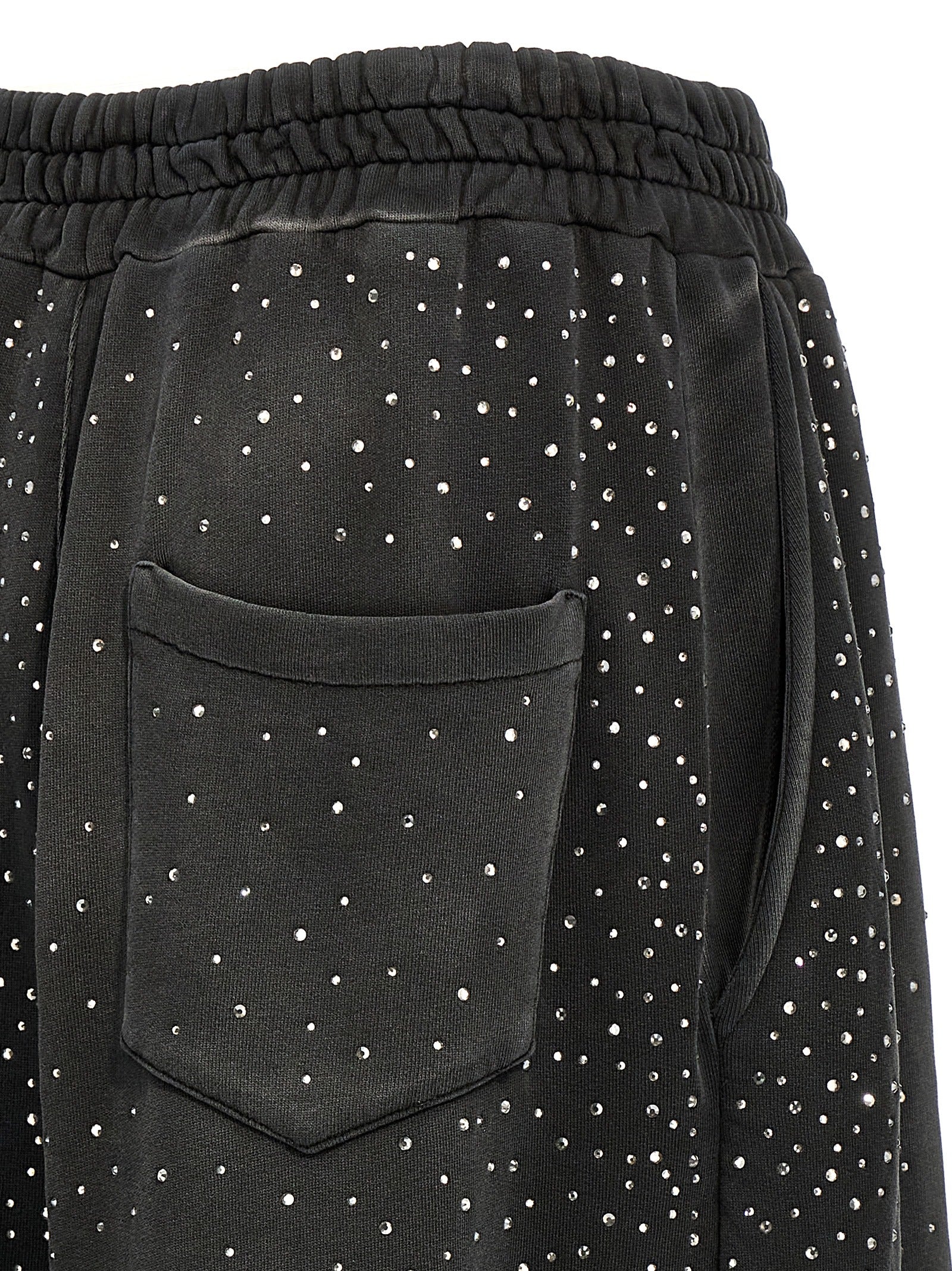 Joggers by Giuseppe Di Morabito for women in cotton & rhinestone black presents a refined pantology silhouette, artfully defined by a refined pantology wide, long, and a sophisticated .