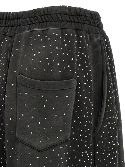Joggers by Giuseppe Di Morabito for women in cotton & rhinestone black presents a refined pantology silhouette, artfully defined by a refined pantology wide, long, and a sophisticated .
