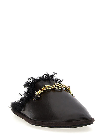 Mules Flat Shoes by Stella McCartney for women in polyethylene polyurethane leather brown showcases a dynamic silhouette, artfully capturing Ryder Women's Polyethylene Polyurethane Leather Mules Flat Shoes through its distinctive and elegant .