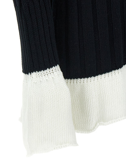 Cardigan by Issey Miyake for women in cotton bicolour, black & white presents a textural silhouette, artfully finished with a textural and for a sophisticated, textural look.