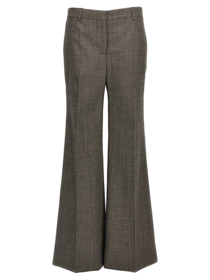 Trousers by Stella McCartney for women in wool gray & houndstooth features an on trend silhouette, showcasing a sophisticated flared with a long and for an on trend finish.