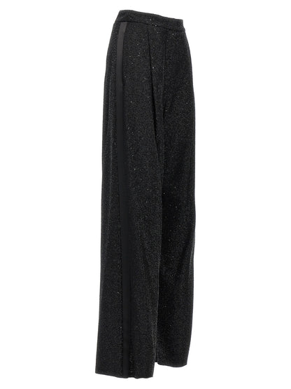 Trousers by Max Mara for women in polyester nylon wool & sequins black presents a smart silhouette, meticulously detailed with a smart wide, a smart long, and a smart .