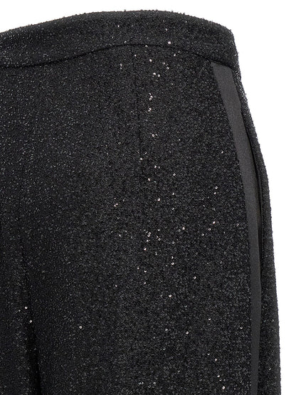 Trousers by Max Mara for women in polyester nylon wool & sequins black features a tailored silhouette with a tailored wide, defined by its long and a sophisticated .