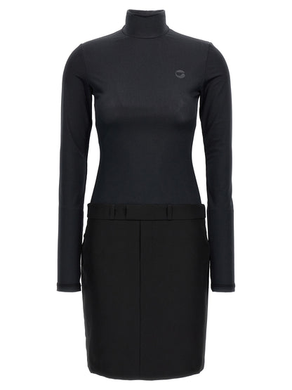 Dress by Coperni for women in polyester black features an eye catching silhouette with a sophisticated high-neck neckline, elegant long-sleeve, and a refined short mini for a eye catching aesthetic.
