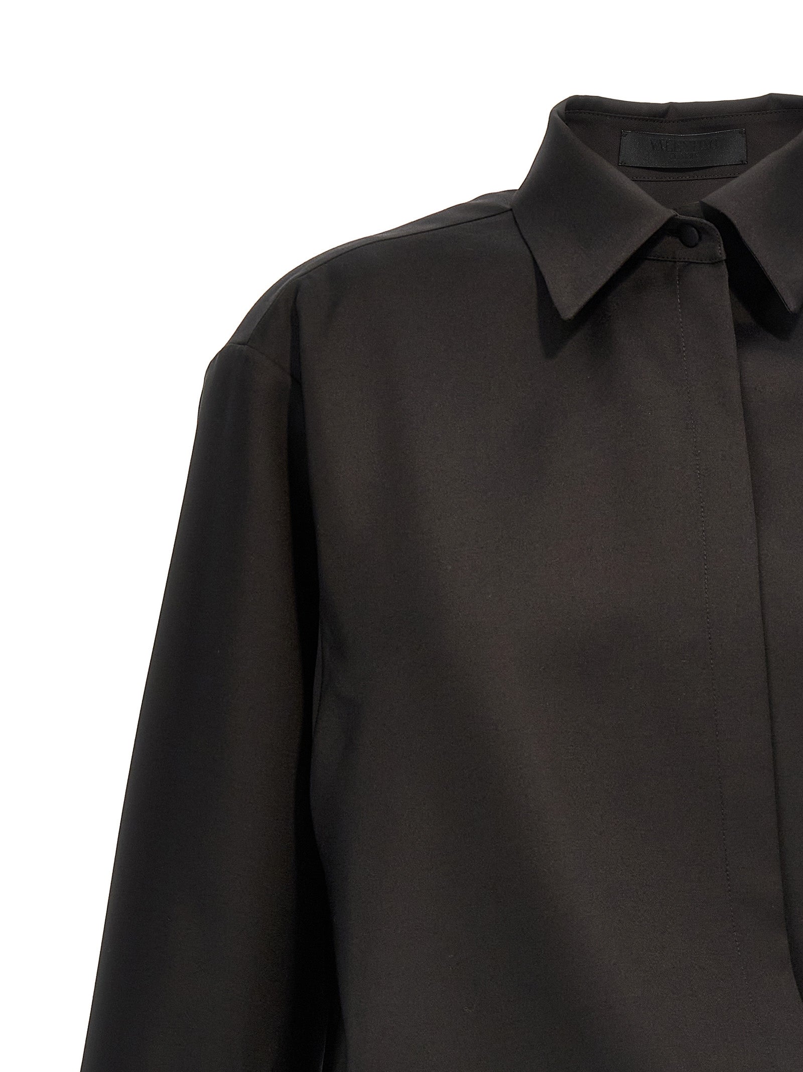 Blouse by Valentino Garavani for women in mohair wool & silk black features an architectural silhouette with a refined and elegant for a architectural look.
