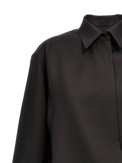 Blouse by Valentino Garavani for women in mohair wool & silk black features an architectural silhouette with a refined and elegant for a architectural look.