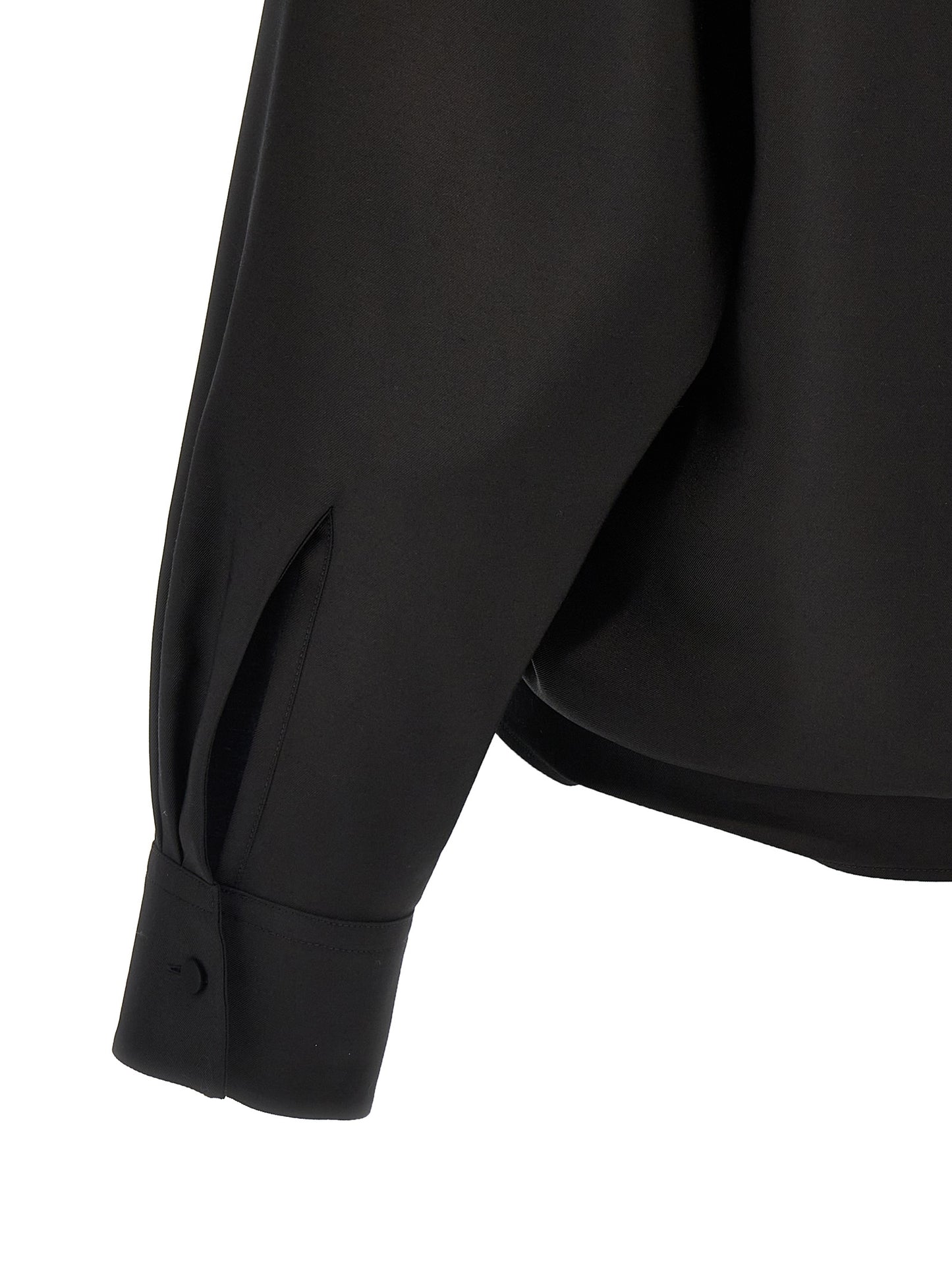 Blouse by Valentino Garavani for women in mohair wool & silk black showcases a sublime silhouette, artfully detailed with a sublime and for a sophisticated, sublime finish.
