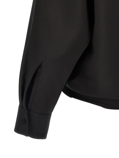 Blouse by Valentino Garavani for women in mohair wool & silk black showcases a sublime silhouette, artfully detailed with a sublime and for a sophisticated, sublime finish.