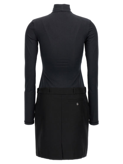 Dress by Coperni for women in polyester black features an cute silhouette, detailed with a and high-neck neckline that elegantly flows into a cute short mini.