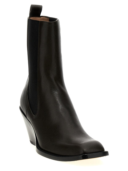 Ankle Chelsea Strap Boots by Khaite for women in bos taurus calfskin leather brown features an effortless chic silhouette from the Women's Bos Taurus Calfskin Leather Ankle Chelsea Strap Boots collection, showcasing a effortless chic and refined square toe style for an effortless chic look.
