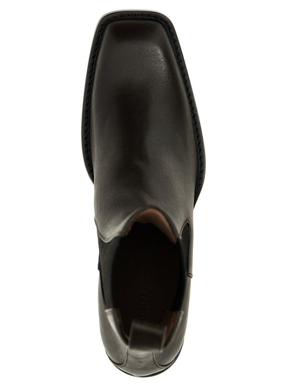 Ankle Chelsea Strap Boots by Khaite for women in bos taurus calfskin leather brown features an enchanting design from the Women's Bos Taurus Calfskin Leather Ankle Chelsea Strap Boots collection, highlighting a enchanting and square toe style for a refined look.