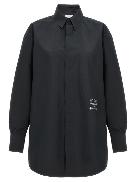 Blouse by MM6 Maison Margiela for women in polyester black showcases a sleek silhouette, elegantly detailed with a sleek and for a sleek finish.