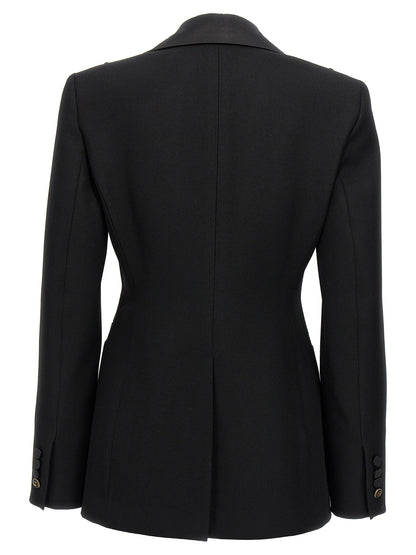 Blazer by Max Mara for women in virgin wool black features an stylish silhouette, showcasing a sophisticated and stylish for a truly stylish finish.