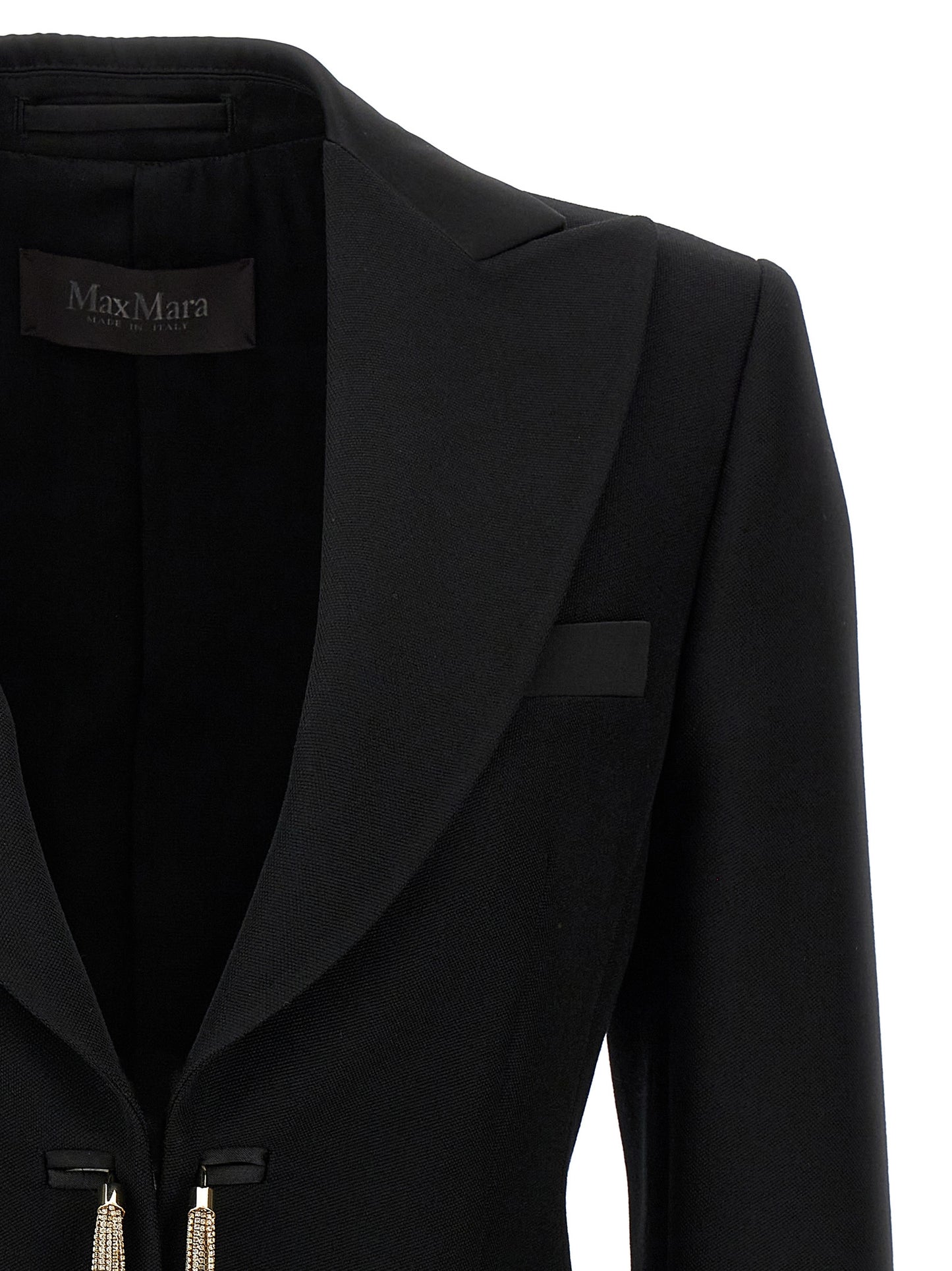 This Blazer by Max Mara for women in virgin wool black presents a tailored silhouette, meticulously tailored with a tailored and distinctive for a tailored finish.