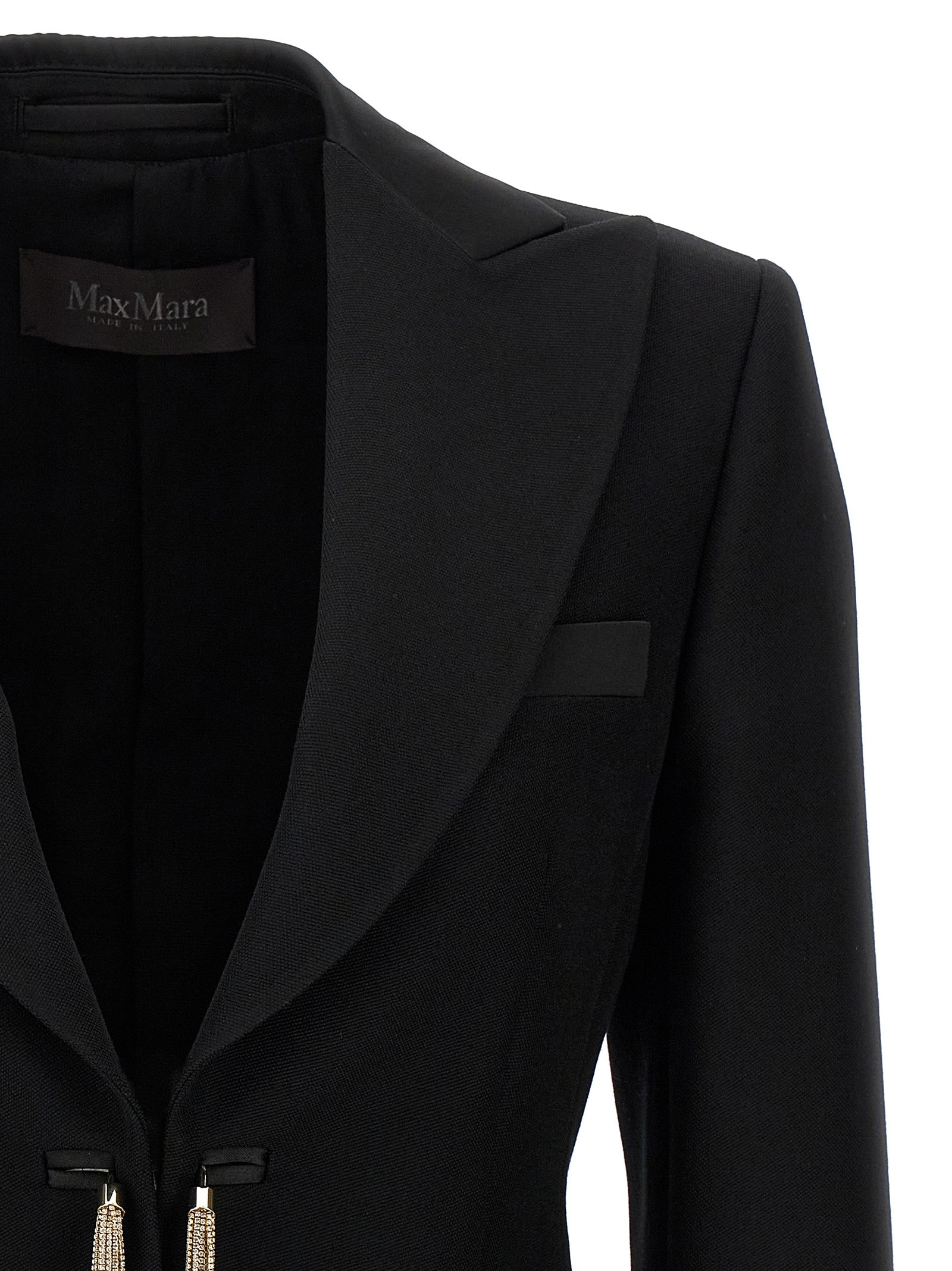 This Blazer by Max Mara for women in virgin wool black presents a tailored silhouette, meticulously tailored with a tailored and distinctive for a tailored finish.
