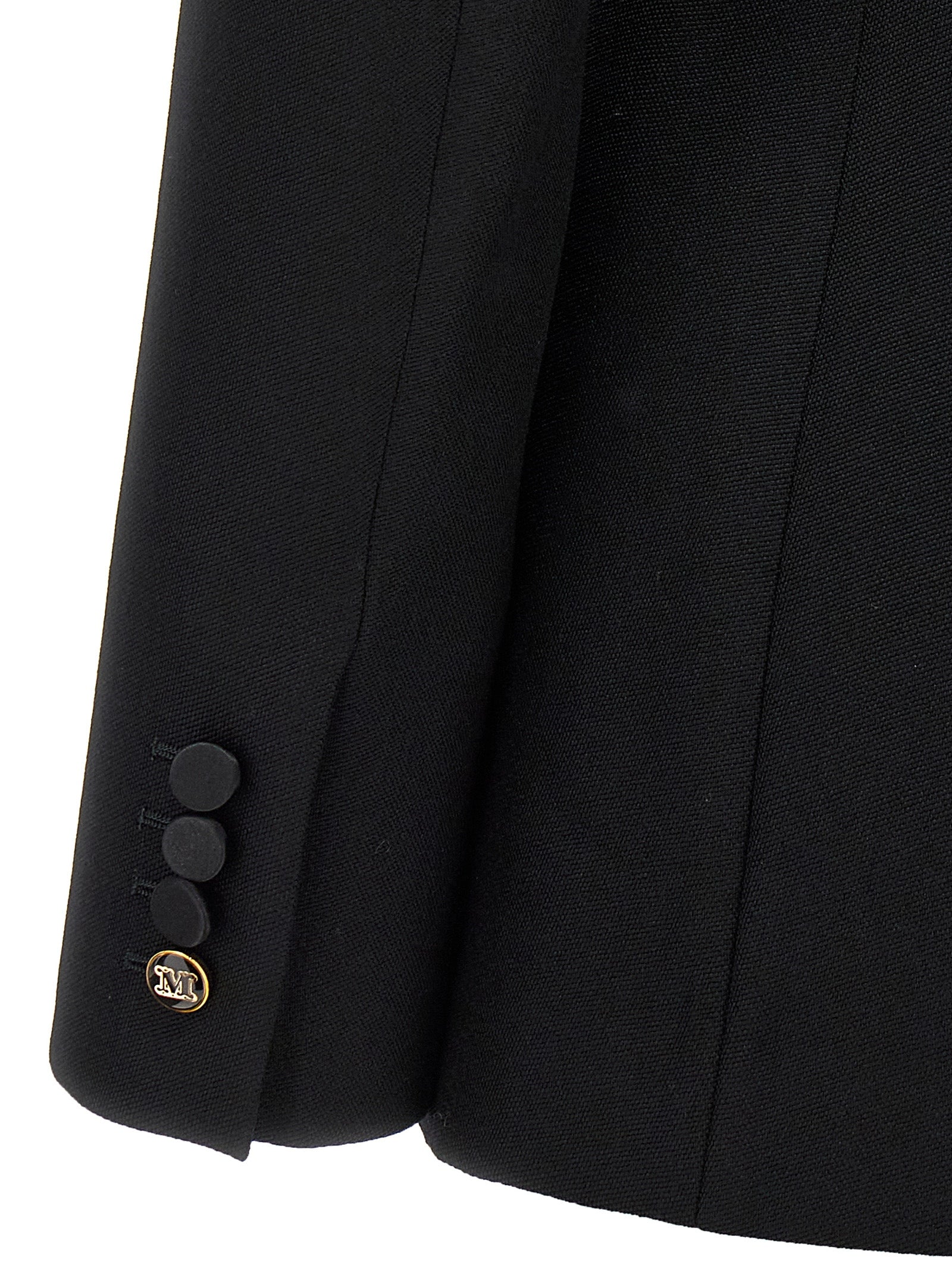 Blazer by Max Mara for women in virgin wool black presents a distinguished silhouette, detailed with a distinguished and distinctive for a truly sophisticated finish.
