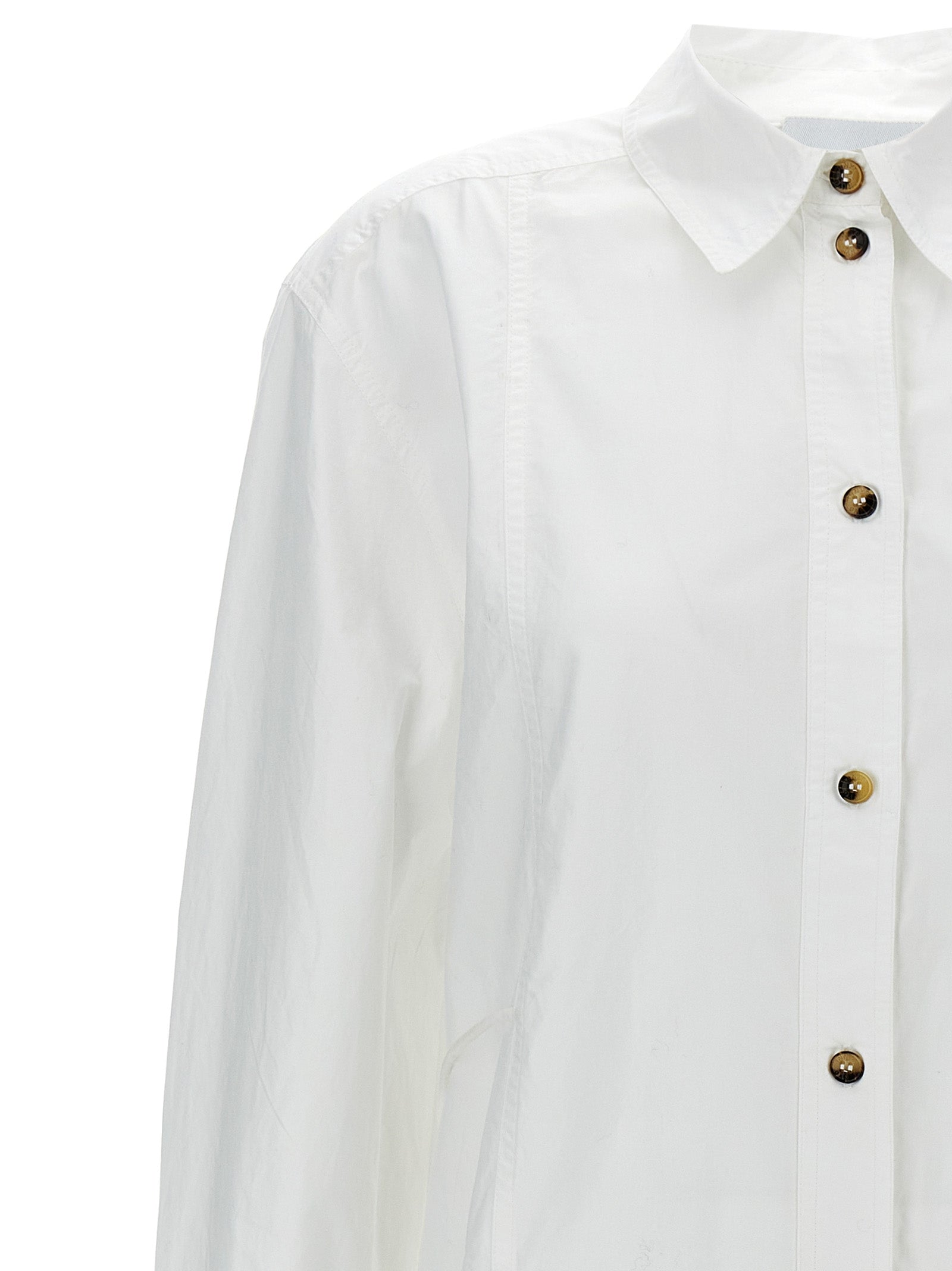 Blouse by Ganni for women in organic cotton white showcases a sleek silhouette, elegantly detailed with a sleek and for a sleek finish.